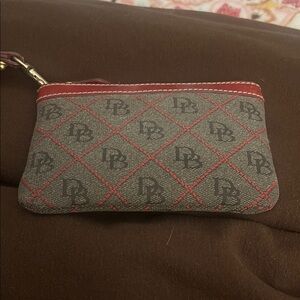 Dooney and Bourke wristlet Red Leather-Trim on gray fabric